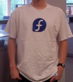 Fedora-logomark-only-tshirt-photo.png
